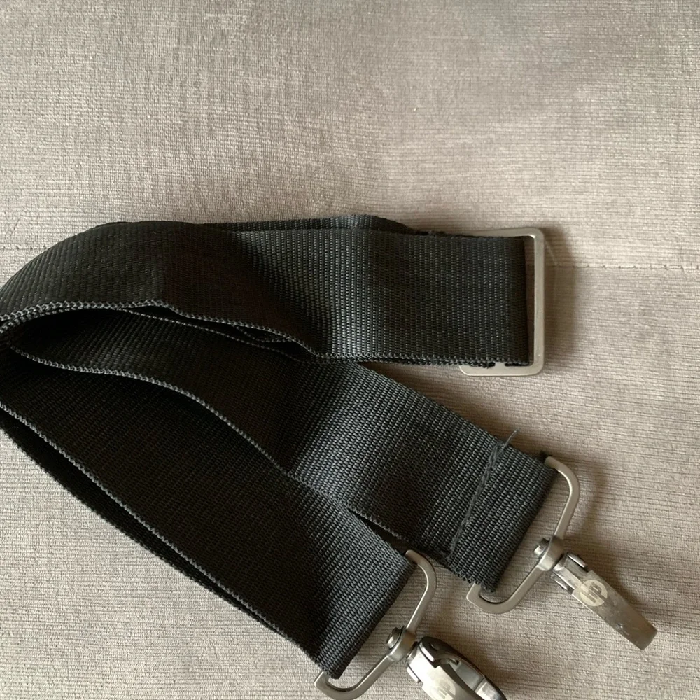 Computer/laptop bag with removable adjustable straps. Lots of compartments